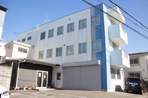 Exterior of the Nadaka Corporation head office building (front view)